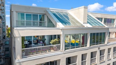 Architect-owned dual-level penthouse offers a serene retreat - photo 5