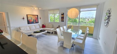 STUNNING CORNER UNIT FULLY FURNISHED!! MOVE IN READY! In the - photo 1
