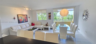 STUNNING CORNER UNIT FULLY FURNISHED!! MOVE IN READY! In the - photo 5