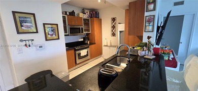 STUNNING CORNER UNIT FULLY FURNISHED!! MOVE IN READY! In the - photo 8