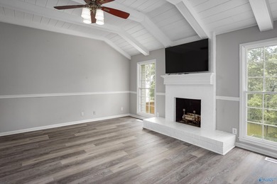 Enjoy lakefront living on Wilson Lake with 125' of waterfront, a - photo 12