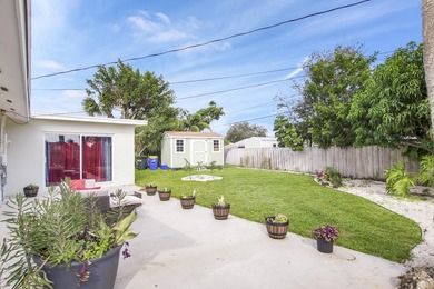 Welcome to this charming 4-bedroom, 2-bathroom home that - photo 15