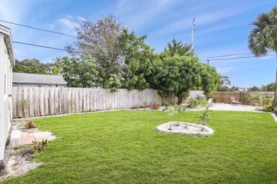 Welcome to this charming 4-bedroom, 2-bathroom home that - photo 16