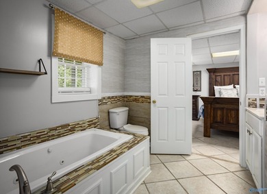 Enjoy lakefront living on Wilson Lake with 125' of waterfront, a - photo 35