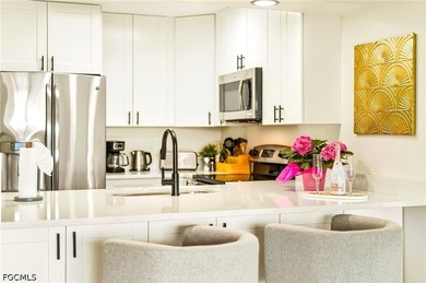 Bright, fully renovated waterfront condo in the desirable Waters - photo 8