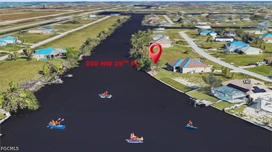 Beautiful Waterfront Lot on the 130+ ft Wide Crete Canal! Build - photo 1