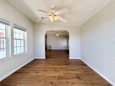 Located in the desirable Pelican Harbor 55+ community, this - photo 4