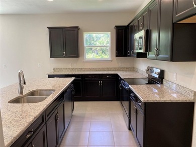 MOVE IN READY!! NEW CONSTRUCTION!! This home features an open - photo 4