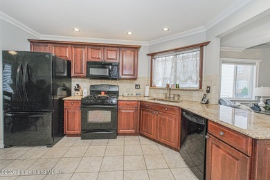 Welcome to this beautifully upgraded semi-attached home in the - photo 16