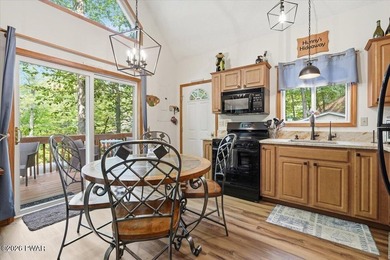 Feels like new! This charming chalet sits on an oversized lot - photo 24