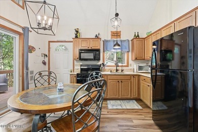 Feels like new! This charming chalet sits on an oversized lot - photo 25