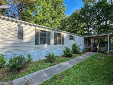Lake Home For Sale in Acworth, Georgia