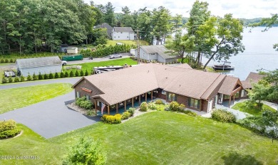 Unique, lakefront 2800 sq. ft Adirondack log cabin ranch - Lake Home For Sale in Queensbury, New York