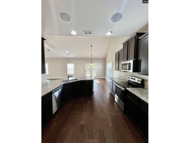 Shoals Landing is a gated community in Irmo.Flooring includes - photo 12