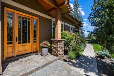 Rare single-level Broken Top townhome ideally located along the - photo 1