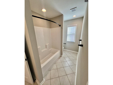 Shoals Landing is a gated community in Irmo.Flooring includes - photo 25
