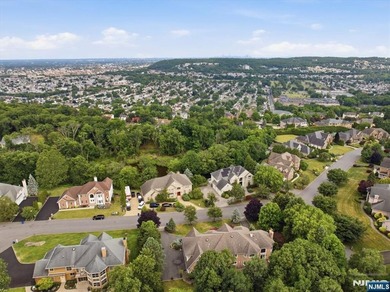 Nestled on a private nearly 1-acre cul-de-sac lot atop - photo 2