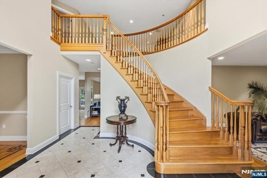Nestled on a private nearly 1-acre cul-de-sac lot atop - photo 3