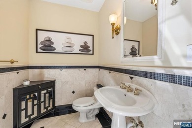 Nestled on a private nearly 1-acre cul-de-sac lot atop - photo 9