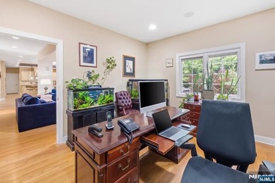 Nestled on a private nearly 1-acre cul-de-sac lot atop - photo 10