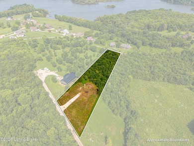 This 1.41-acre wooded lot offers an ideal setting for a - photo 1
