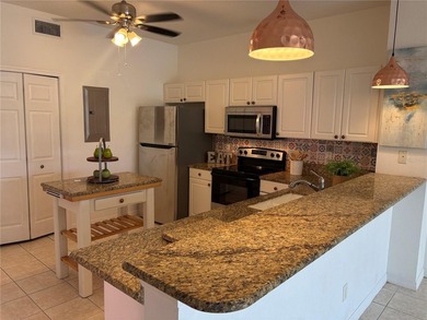 You'll love this FIRST FLOOR CONDO in the beautiful gated