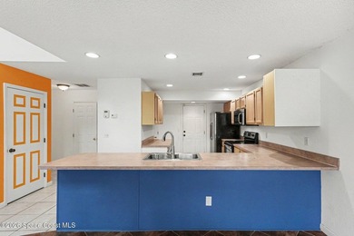Centrally located in Titusville, this 2-bedroom, 2.5-bath - photo 12