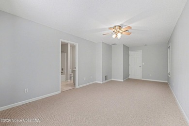 Centrally located in Titusville, this 2-bedroom, 2.5-bath - photo 14
