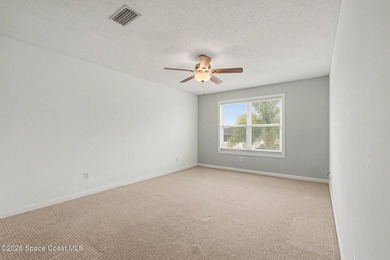 Centrally located in Titusville, this 2-bedroom, 2.5-bath - photo 16