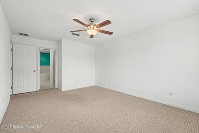 Centrally located in Titusville, this 2-bedroom, 2.5-bath - photo 18