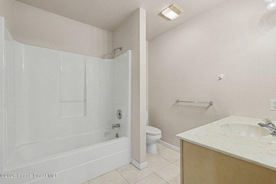 Centrally located in Titusville, this 2-bedroom, 2.5-bath - photo 19