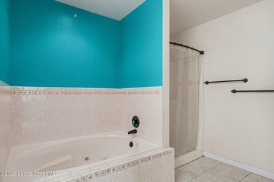 Centrally located in Titusville, this 2-bedroom, 2.5-bath - photo 22