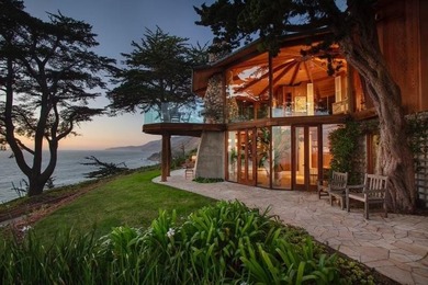 This oceanside sanctuary is set on a private forested promontory - photo 2