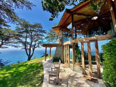 This oceanside sanctuary is set on a private forested promontory - photo 8