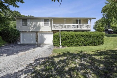 Enjoy lake views and flexible living space in this charming - photo 1