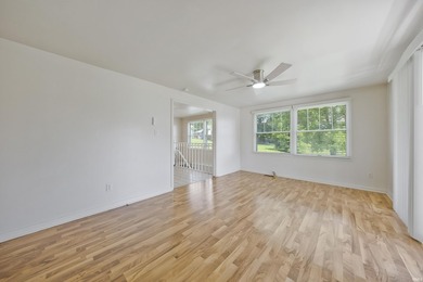 Enjoy lake views and flexible living space in this charming - photo 9