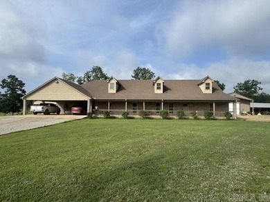Built in 2021, this 4,304 sq. ft. brick home anchors an - photo 1
