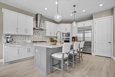 Welcome to refined luxury in the prestigious Watermark at Avenir - photo 19