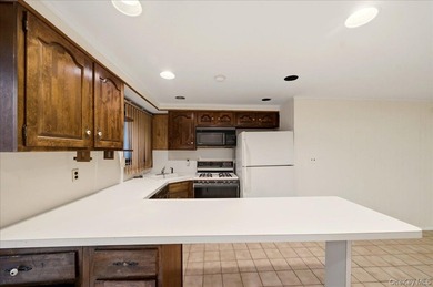Welcome to this charming two-family Colonial-style duplex in the - photo 20