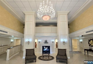 Step inside this Stunning, Custom, Top Floor Corner Unit and