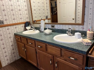 Country charm meets modern comfort! Nestled on 2 +- acres with a