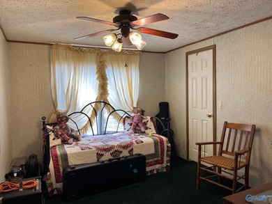 Country charm meets modern comfort! Nestled on 2 +- acres with a