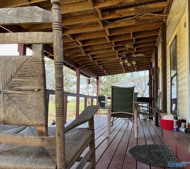 Country charm meets modern comfort! Nestled on 2 +- acres with a