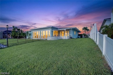 DIRECT GULF ACCESS + NO BRIDGES! This waterfront gem offers the - photo 2