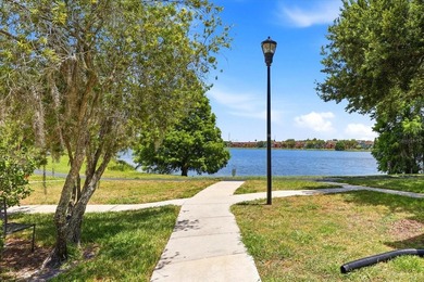Virtually Staged. Welcome home to the gated community of Lake - photo 5