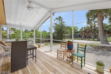 Welcome to your dream island retreat at 7257 Victory Rd in - photo 10