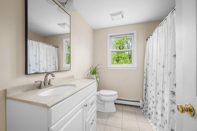 Spacious 4 bedroom cape w/seasonal water views of Ashument Pond! - photo 11