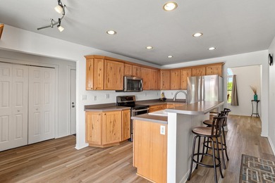 Tucked off the road on 4 peaceful acres, this 2005 custom ranch - photo 9