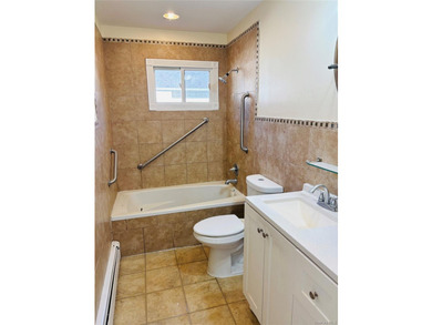 High Ranch With Updated Kitchen And Large Living Room. Hardwood - photo 7