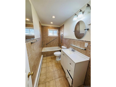 High Ranch With Updated Kitchen And Large Living Room. Hardwood - photo 8